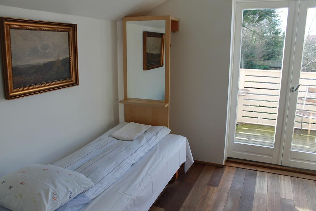 Quarto Familiar com Casa de Banho Partilhada
